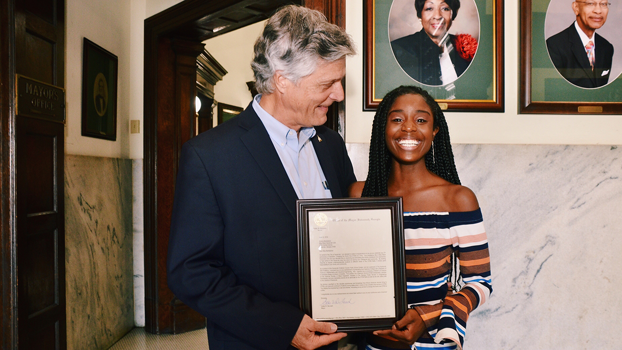 Ambria Berksteiner (right) with Savannah Mayor Eddie DeLoach.