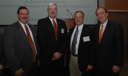 John Mason, vice president for research, Rodney Robertson, director of Auburn's Huntsville Research Center, and Jay Gogue, president of Auburn University