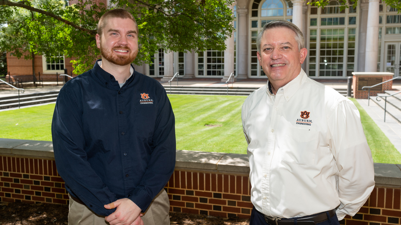 Gregory Purdy, assistant professor in the Department of Industrial and Systems Engineering stands next to Gregory Harris, director of ICAMS and ISE chair, for a photo on Auburn University’s campus. 