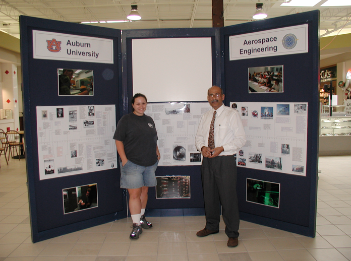 Poster display with student and Ahmed 