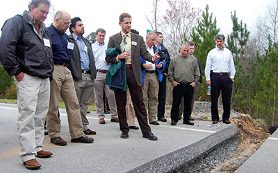 Dr. David Timm, Brasfield and Gorrie Professor of Civil Engineering at Auburn University, gives a tour of the structural sections of the 2009 test track during the NCAT Pavement Test Track Conference.