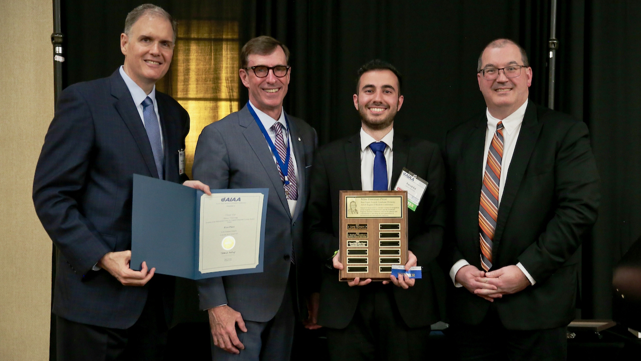 Patrick Eid is recognized with the first-place award and Mike Freeman prize in the graduate division at the 76th annual Southeastern Regional Student Conference of the American Institute of Aeronautics and Astronautics in Greensboro, North Carolina. Pictured from left are Patrick Porter, Clay Mowry, Eid and Kurt Polzin.