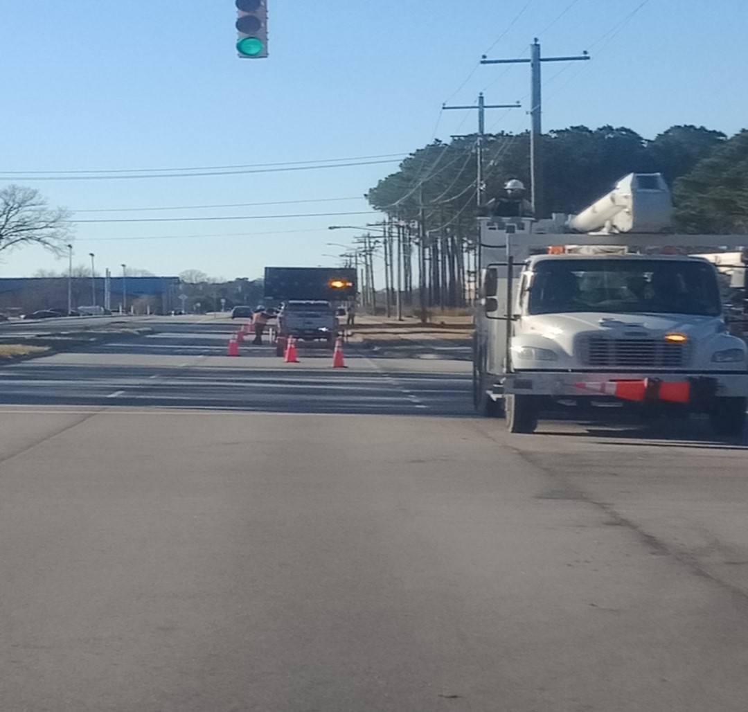 road crew closing the right-lane on a multi-lane highway