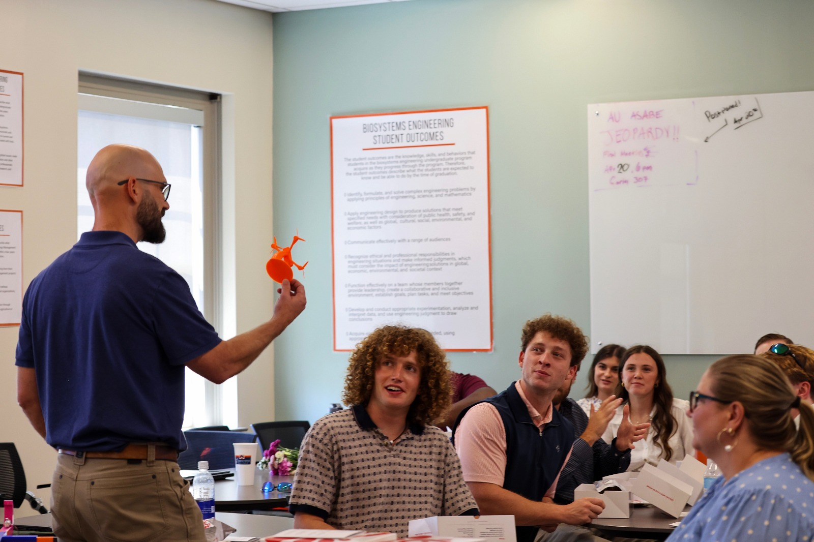 Faculty member talking to students