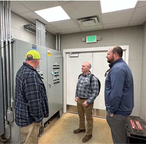cyber security team members learning about the technology at a water treatment plant