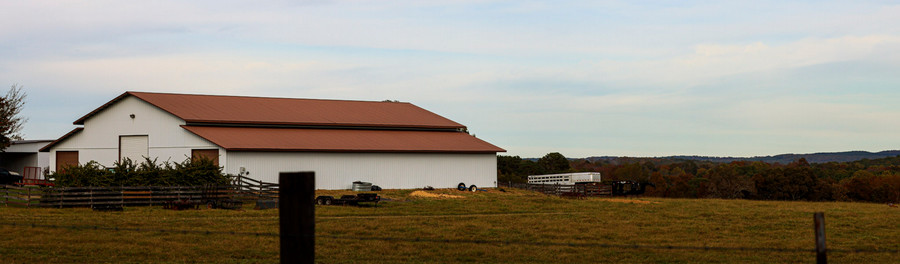 Outside of a large chicken house