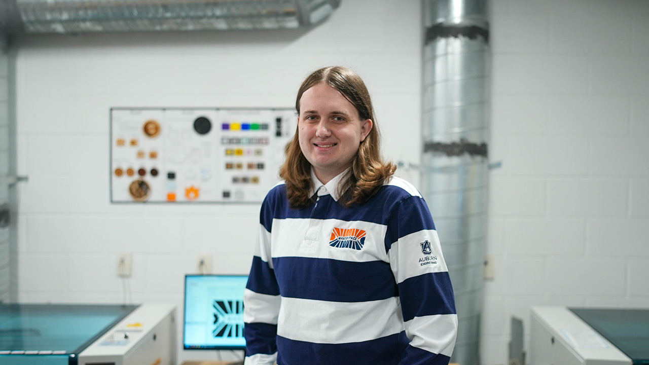 David Bevly, Laurence Rilett and Shiwen Mao stand inside an Auburn University building while leading a federally funded study on RFID-based smart tire sensors for commercial truck safety.