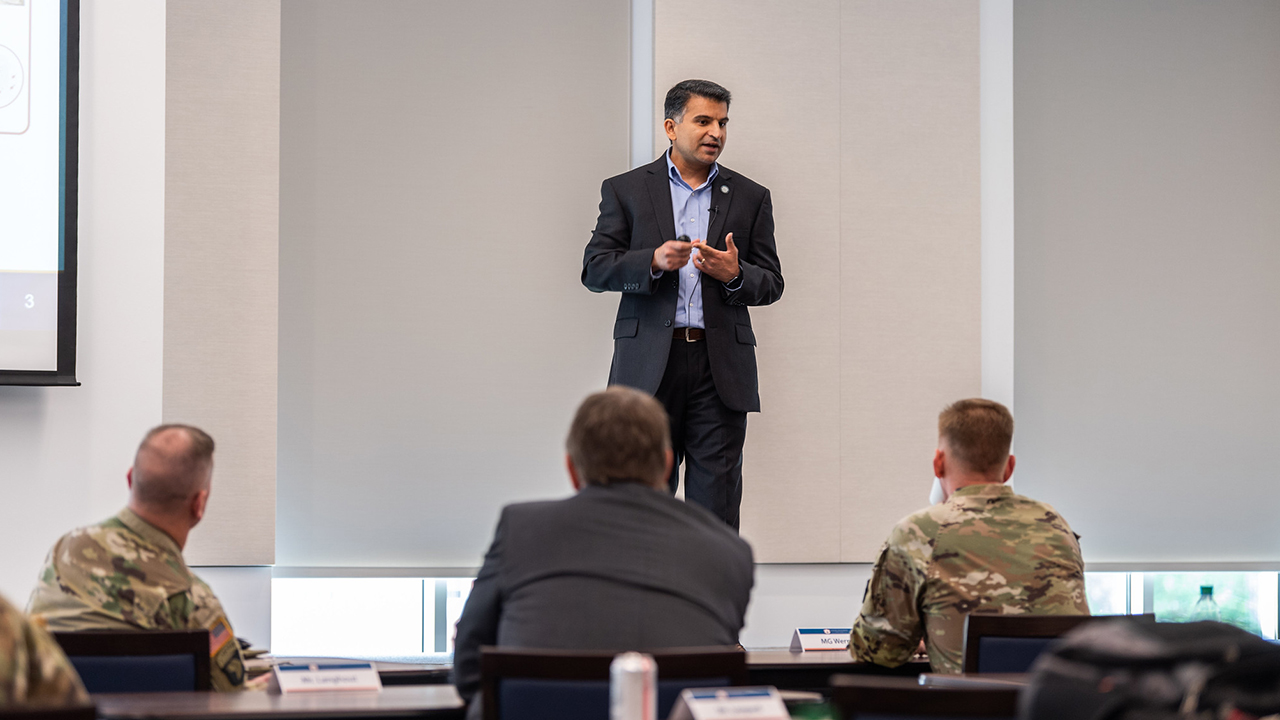 Nima Shamsaei, director of Auburn's National Center for Additive Manufacturing Excellence, speaks on qualification for additively manufactured materials and parts at the recent Army Additive Manufacturing Summit. Seated, from left to right, are: Maj. Gen. K. Todd Royar, commanding general of U.S. Army Aviation and Missile Command; Jeffrey Langhout, director of the U.S. Army Combat Capabilities Development Command Aviation & Missile Center; and Maj. Gen. Darren L. Werner, commanding general of the U.S. Army Tank-automotive and Armaments Command.  