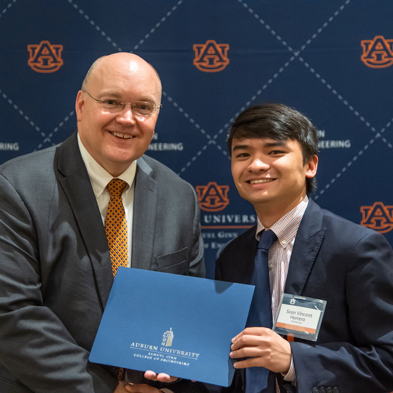 Outstanding Mechanical Engineering Student Sean Herrera is pictured with Dean Christopher B. Roberts. Sean also received the Samuel Ginn Outstanding Student Award.
