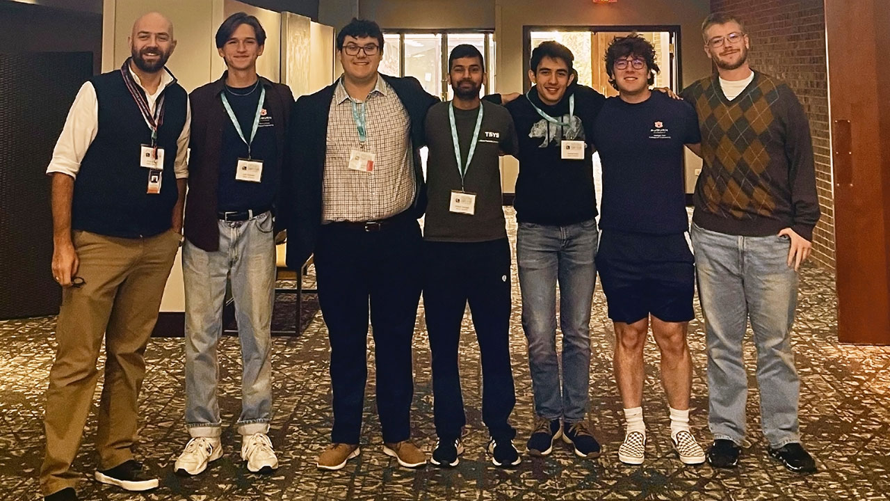 Team members making the trip to CyberForce included, from left to right, Farak Kandah (mentor), Luke Robinson, Jonathan Story, Hemant Sherawat, Andrew Pruett, Walker McGilvary and Kyle Ackerman.