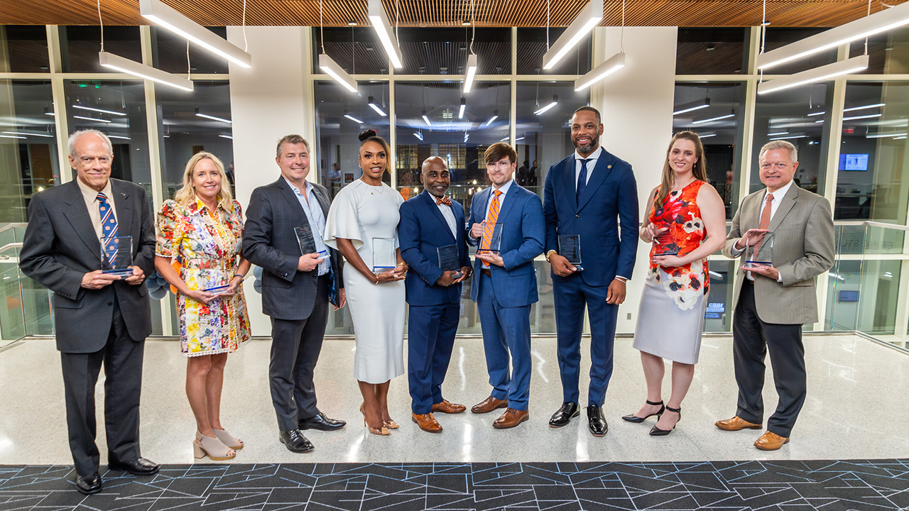 The 2023 Auburn Alumni Engineering Council award winners included Distinguished Auburn Engineer Ed Yeilding, ’72 electrical engineering; Distinguished Auburn Engineer Pam Boyd, ’92 electrical engineering; Distinguished Auburn Engineer Richard Kretzschmar, ’90 and ’96 aerospace engineering; Outstanding Young Auburn Engineer Rodmesia Clarke, ’08 chemical engineering; Distinguished Auburn Engineer Metrick Houser, ’93 chemical engineering; Distinguished Auburn Engineer Mike Ogles, ’89 mechanical engineering, represented by his son Will Ogles; Outstanding Young Auburn Engineer Brandon Young, ’10 electrical engineering; Outstanding Young Auburn Engineer Christa Musgrove, ’07 mechanical engineering; and Superior Service Steve Duke, chemical engineering associate professor and the college’s former associate dean for academics.