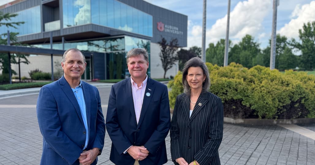 In Huntsville, AUARI leaders Jonathan Pettus and Melanie Baker join SDA‑South site director Burke Hare (center) in advancing Auburn’s role in mission‑critical space operations by uniting academic insight with real‑world defense challenges.