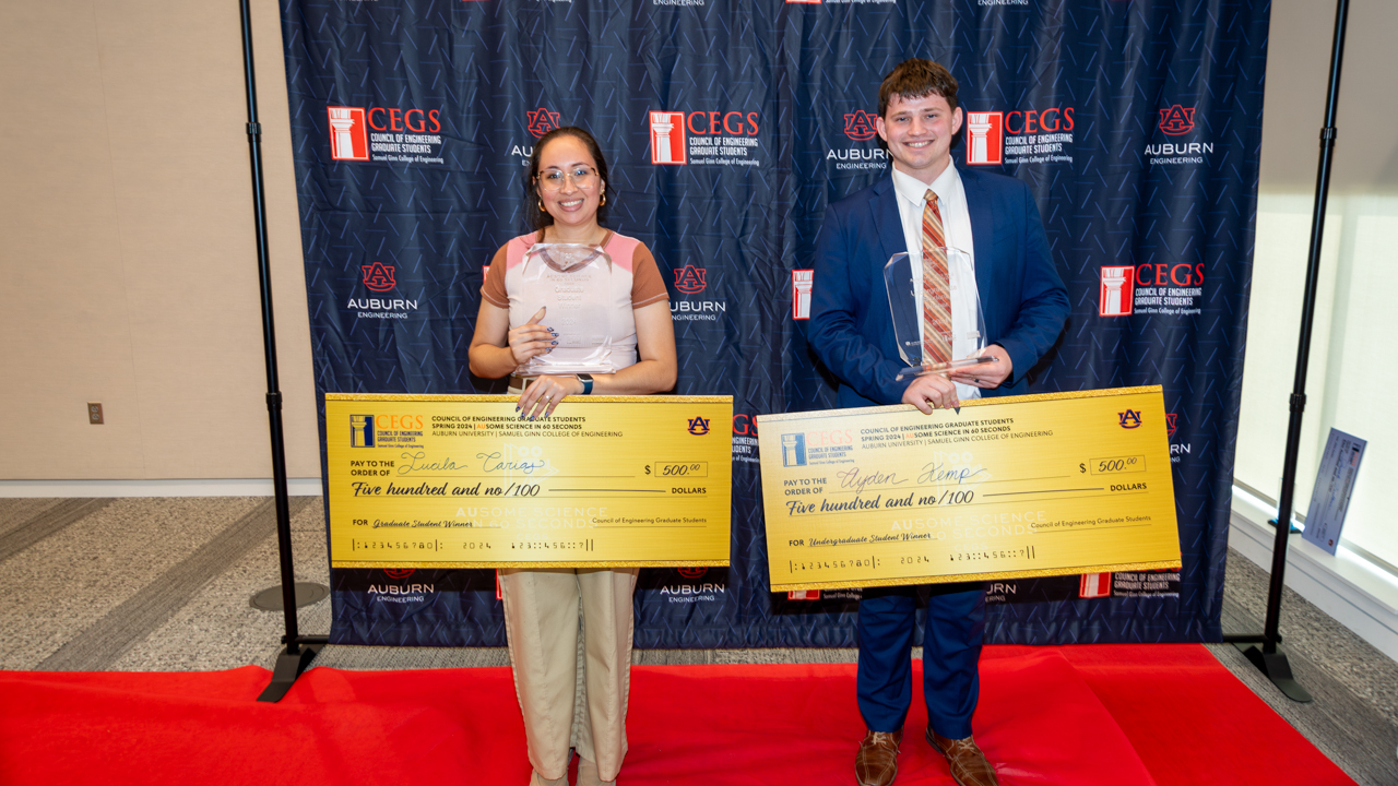 AUSome Science in 60 Seconds overall graduate winner Lucila Carias, left, and undergraduate winner Ayden Kemp.