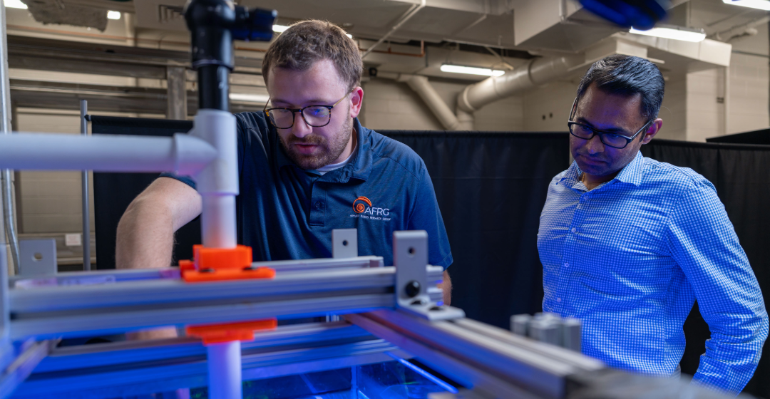 Graduate student Will McAtee, left, and associate professor Vrishank Raghav work in an Auburn Engineering laboratory.