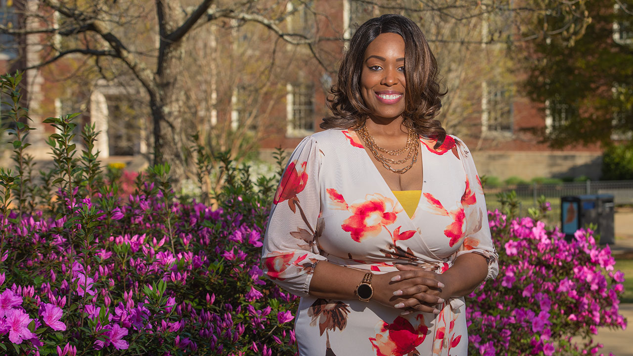 Alicia Harkless poses outdoors.
