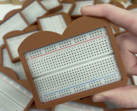 A generic square placeholder image with rounded corners in a figure.