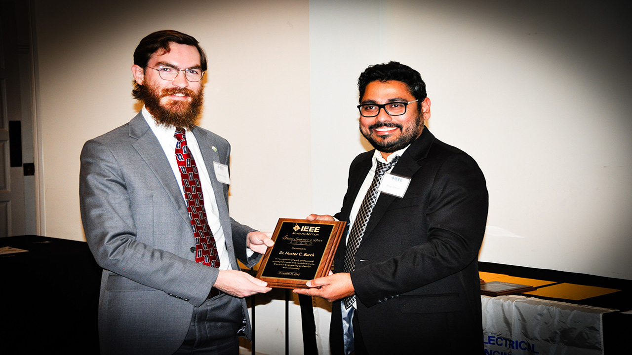 Hunter Burch, left, with Alabama IEEE Section Chair Arup Ghosh.