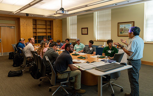 A generic square placeholder image with rounded corners in a figure.