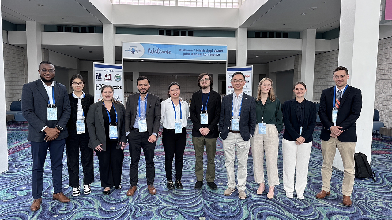 Several students in Auburn University’s Water and Environmental Student Association pose for a photo at the Alabama/Mississippi Water Joint Annual Conference. 