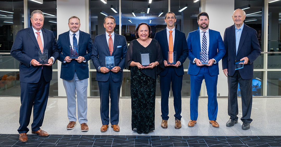 Awardees included (L-R): Distinguished Auburn Engineers Steve Cates, Gaines Gibson (representing his father, Edd Gibson), Jim Heilbron and Karen Rowell; Outstanding Young Auburn Engineers Jager Livingston and Jordan Ross; and Superior Service recipient David Dyer.