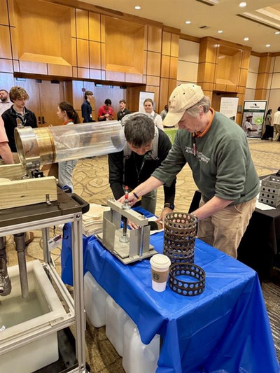 A generic square placeholder image with rounded corners in a figure.