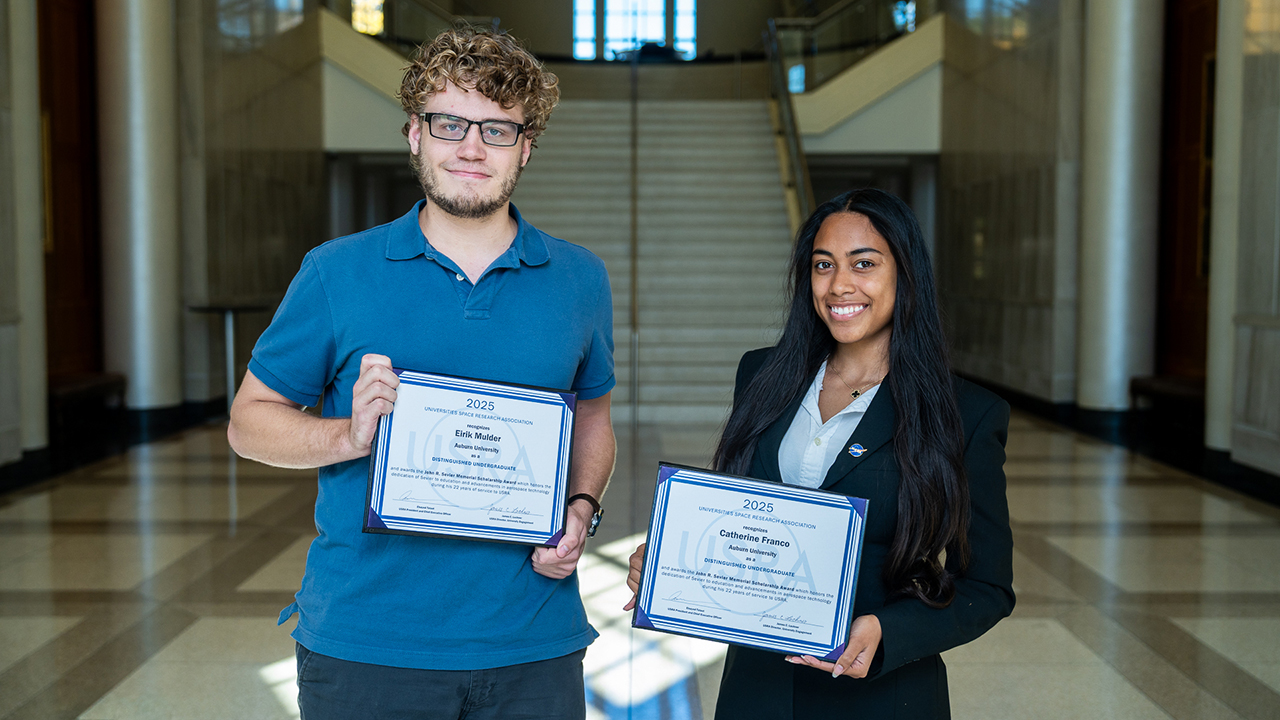 Auburn engineering students Eirik Mulder and Catherine Franco hold their certificates after being named 2025 USRA Distinguished Undergraduates — the first recipients of the award in university history.