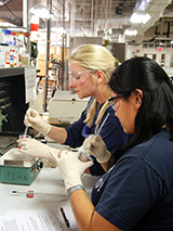 Students mixing chemicals