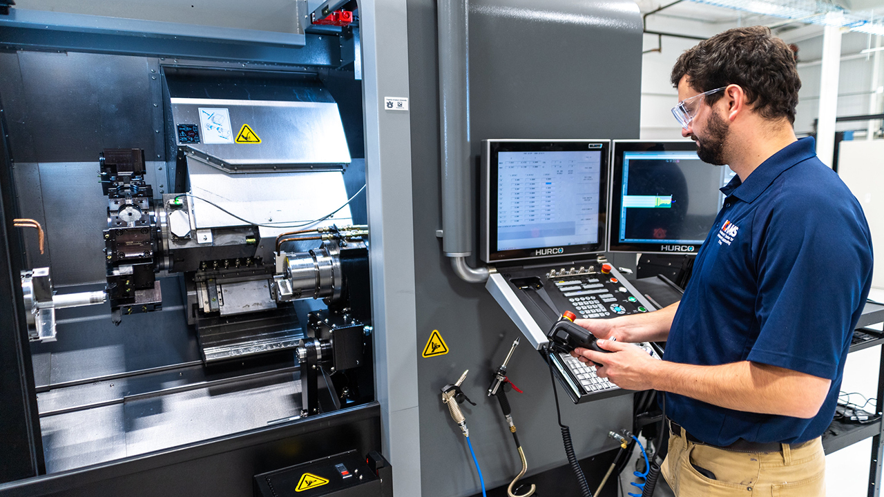 student working at machine