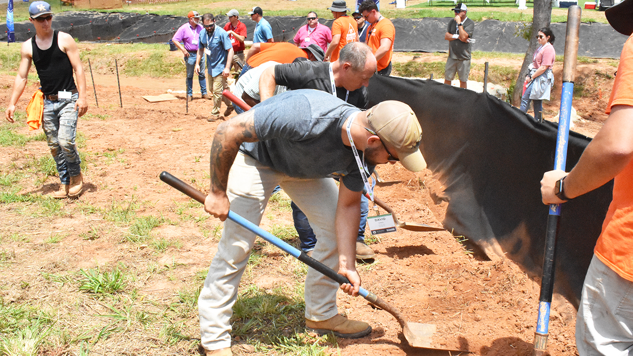 People digging trenches at stormwater facility