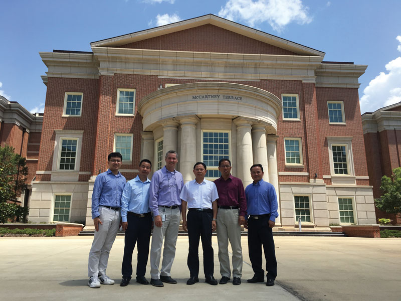 Employees of Sinyue visit Auburn University on a campus tour. From left, NCAT Postdoctoral Researcher Fan Gu, Sinyue Senior Advisor Bin Wang, NCAT Director Randy West, Sinyue President Shuihui Wu, Sinyue Senior Advisor James Luo, and NCAT Associate Research Professor Nam Tran.