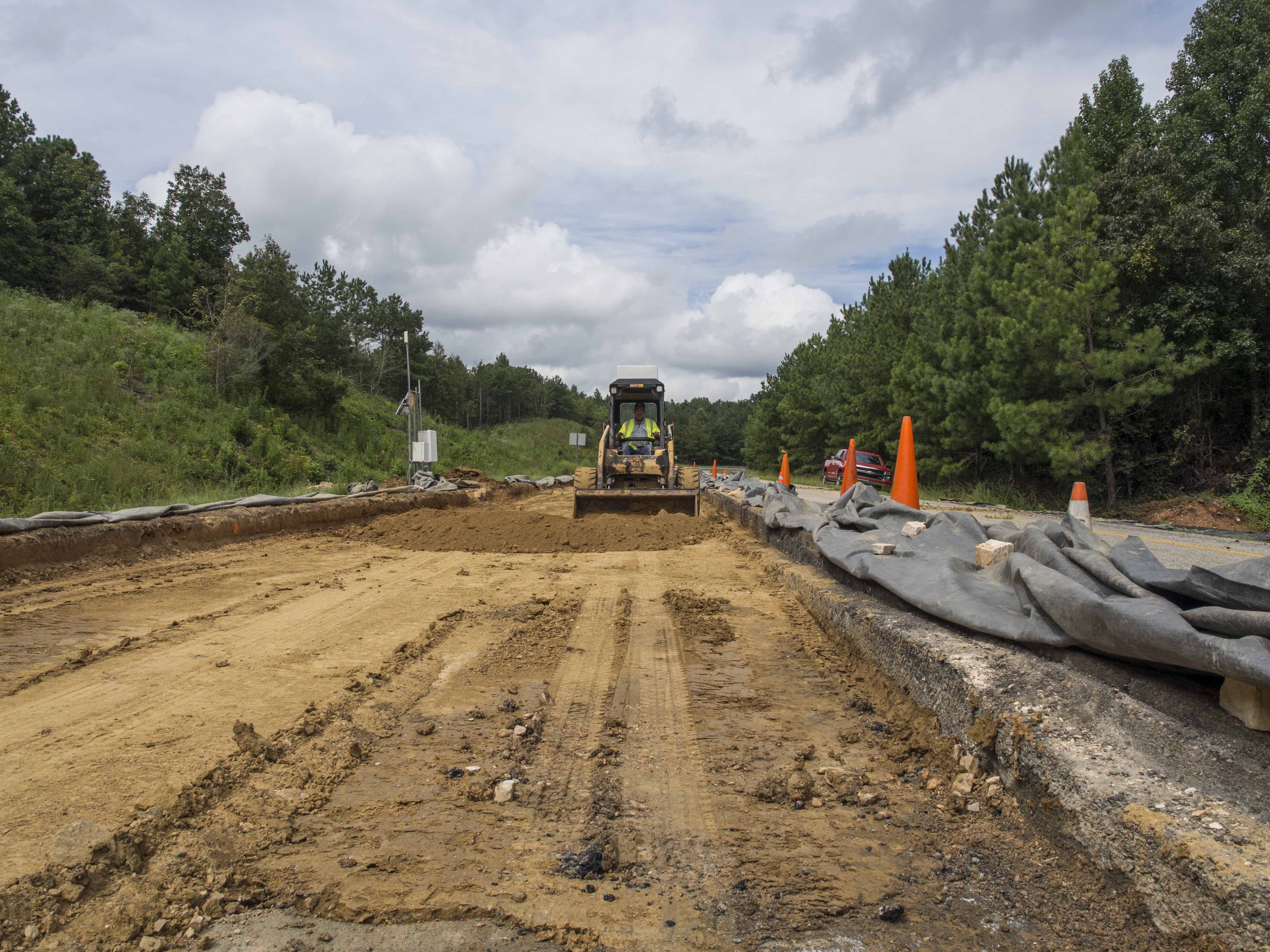 Section S2 is excavated and filled with native Mississippi subgrade prior to a lime stabilization treatment.