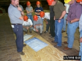 Students observe shop drawings in preparation for making full sized pattern